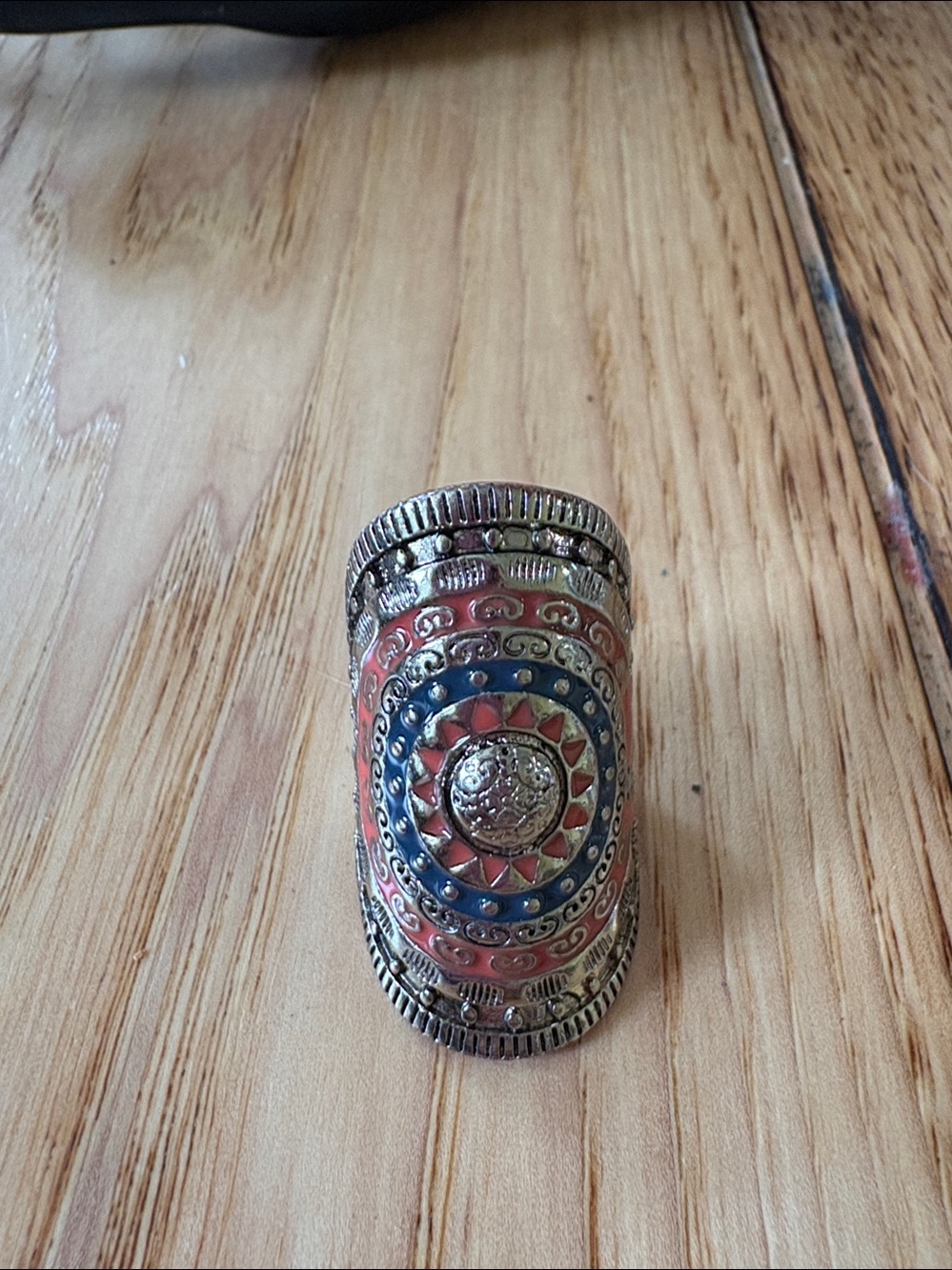 Ornate Silver-Tone Decorative Ring with Orange & Teal 
Accents